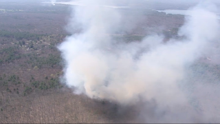 A brush fire burning in Northboro, Massachusetts, on Friday, April 14, 2023.