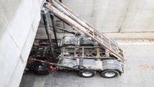 A truck stuck on an entrance to Interstate 93 south in Boston on Wednesday, April 5, 2023.