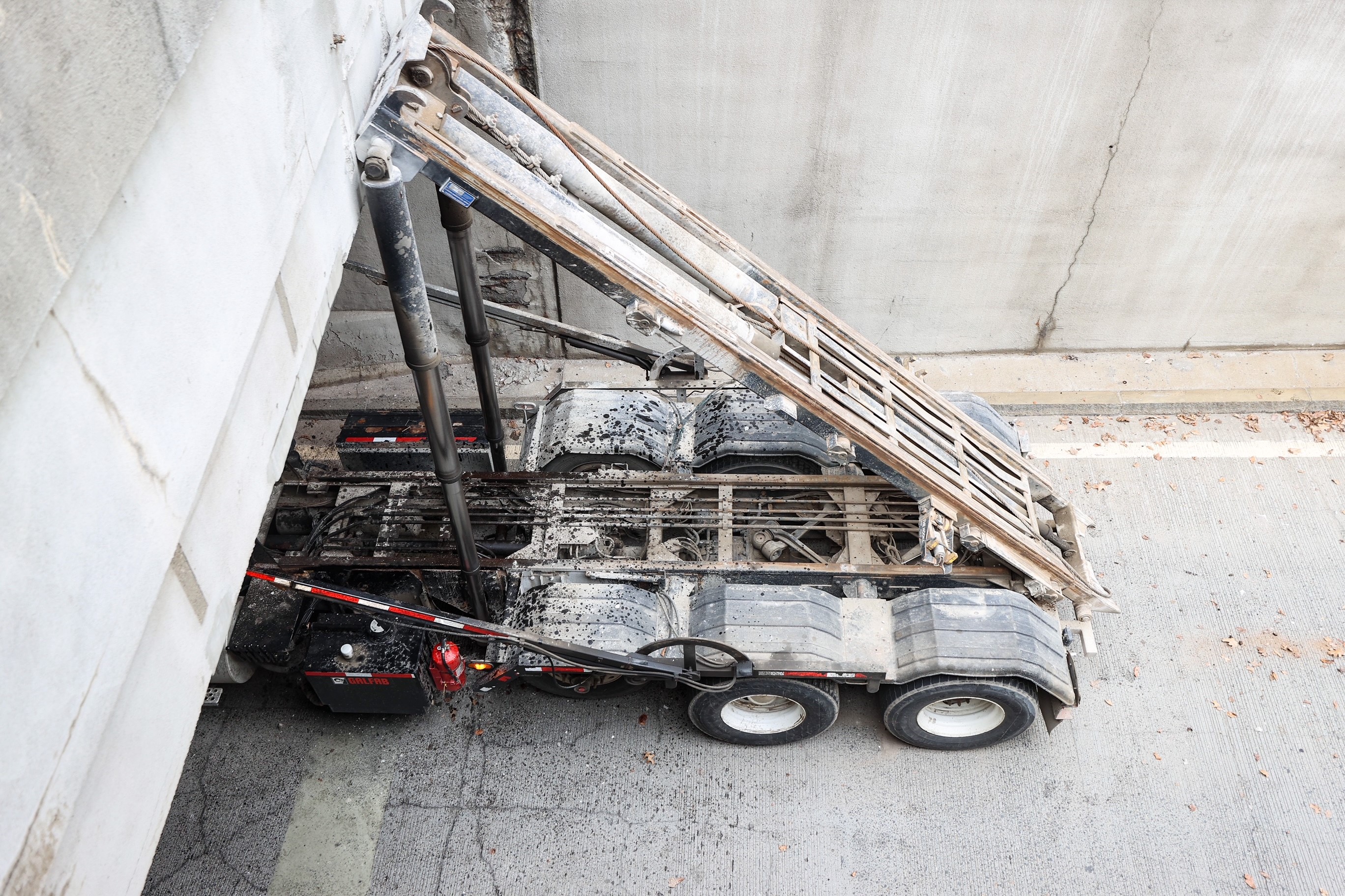 A truck stuck on an entrance to Interstate 93 south in Boston on Wednesday, April 5, 2023.