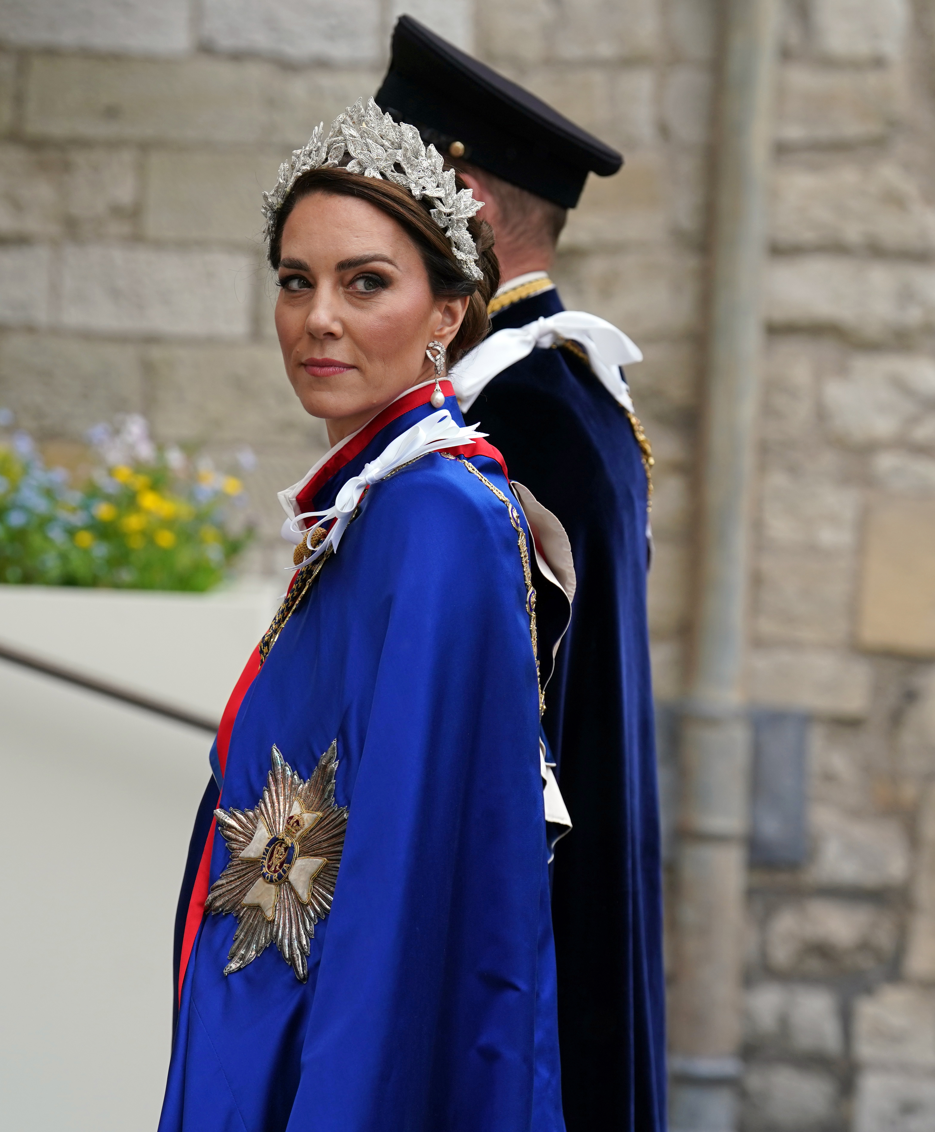 Catherine, Princess of Wales and Prince William, Prince of Wales arrive at the Coronation of King Charles III and Queen Camilla on May 6, 2023 in London, England.