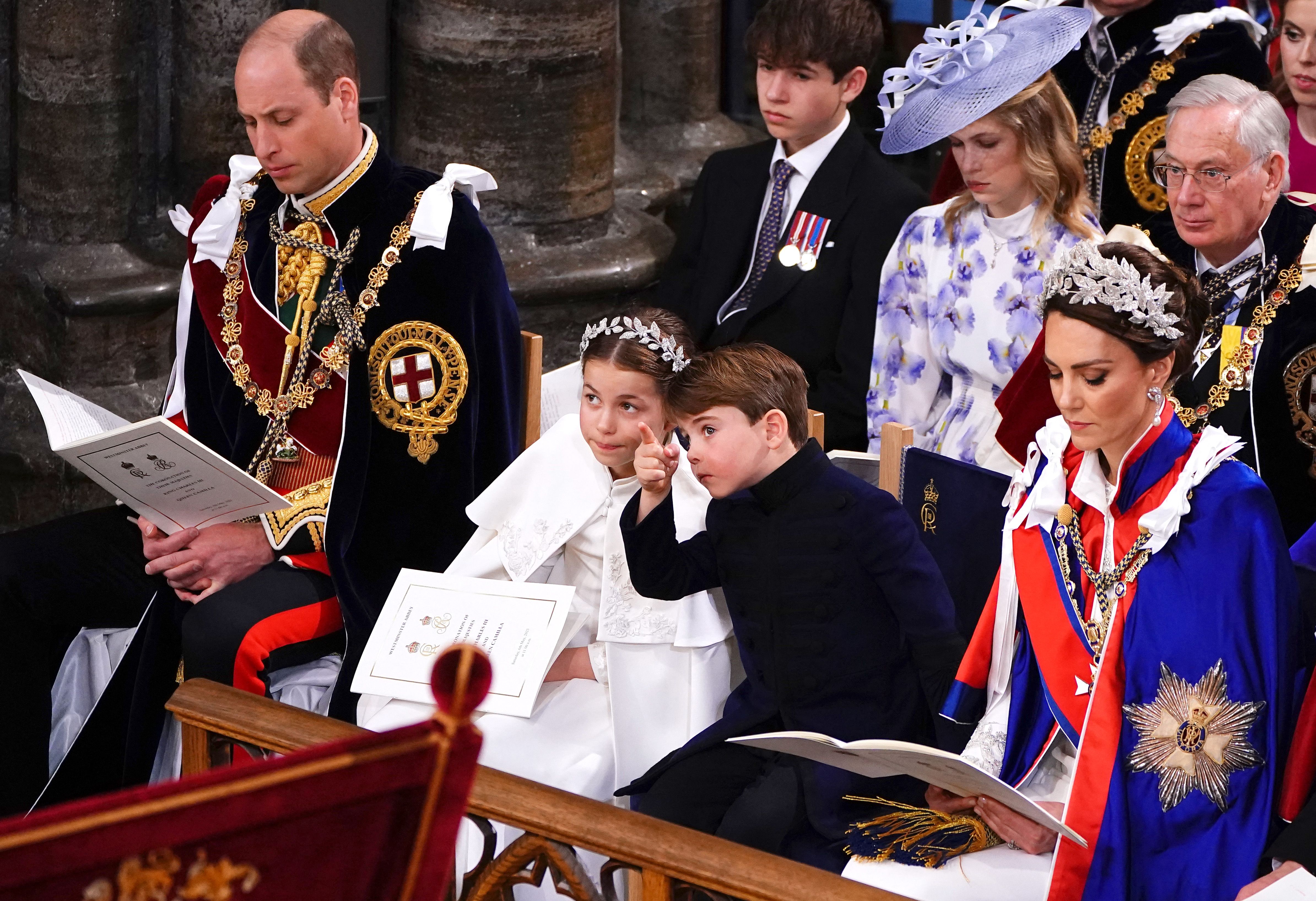 From left: Britain’s Prince William, Prince of Wales, Princess Charlotte, Prince Louis and Britain’s Catherine, Princess of Wales attend the coronations of Britain’s King Charles III and Britain’s Camilla, Queen Consort at Westminster Abbey in central London on May 6, 2023.