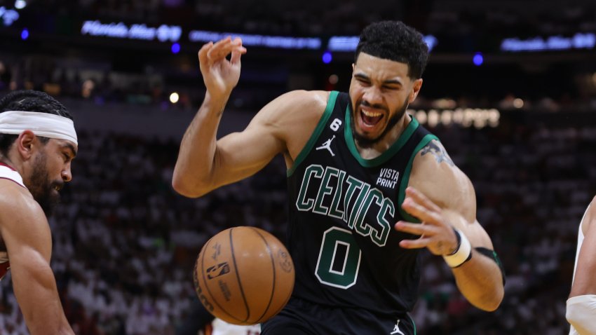 MIAMI, FLORIDA – MAY 21: Jayson Tatum #0 of the Boston Celtics battles for the ball during the second quarter against the Miami Heat in game three of the Eastern Conference Finals at Kaseya Center on May 21, 2023 in Miami, Florida. NOTE TO USER: User expressly acknowledges and agrees that, by downloading and or using this photograph, User is consenting to the terms and conditions of the Getty Images License Agreement. (Photo by Megan Briggs/Getty Images)
