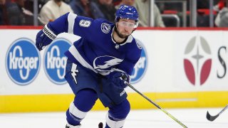 Mar 14, 2019; Detroit, MI, USA; Tampa Bay Lightning center Tyler Johnson (9) skates to the puck during the third period against the Detroit Red Wings at Little Caesars Arena. Mandatory Credit: Raj Mehta-USA TODAY Sports