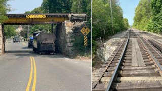 The aftermath of a train bridge strike in Dedham, Massachusetts, on Monday, May 15, 2023, that caused the cancellation of Foxboro trains on the MBTA Commuter Rail.