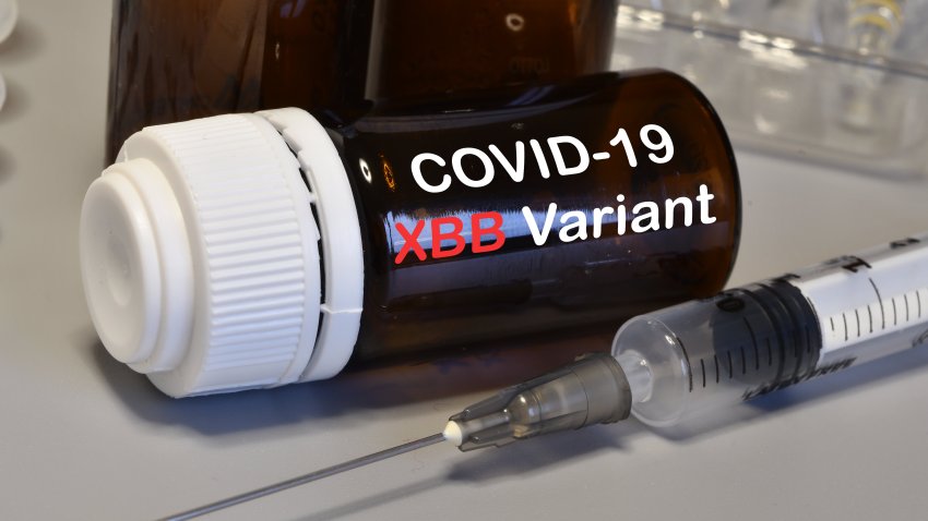 Syringe with Covid-19 vaccine against the XBB Variant. Fight against virus Covid-19 Coronavirus, Vaccination and immunization.