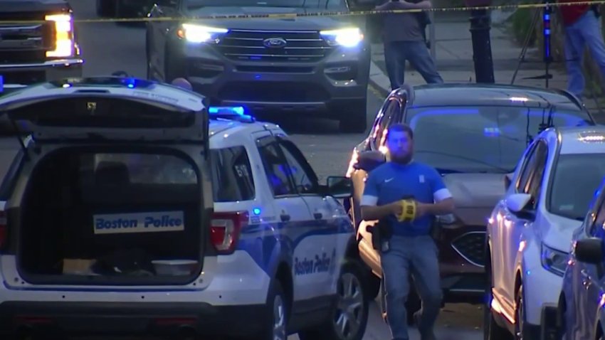 Search for driver after officer shoots at SUV