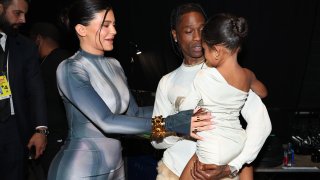 LAS VEGAS, NV – May 15: 2022 BILLBOARD MUSIC AWARDS — Pictured: (l-r) Kylie Jenner, Stormi Webster, and Travis Scott backstage during the 2022 Billboard Music Awards held at the MGM Grand Garden Arena on May 15, 2022. — (Photo by Christopher Polk/NBC/NBCU Photo Bank via Getty Images)