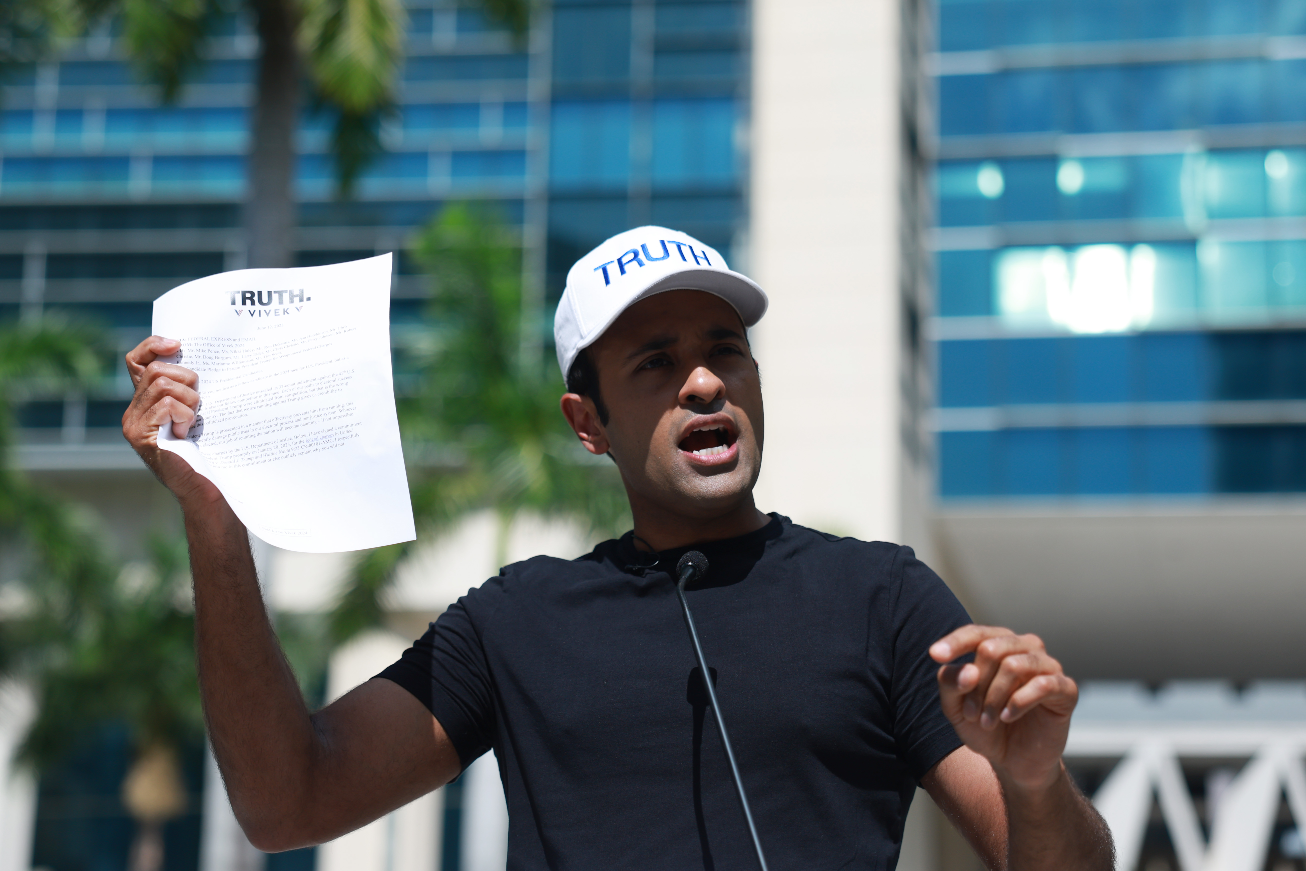 Republican presidential candidate Vivek Ramaswamy talks to the media about the FOIA request regarding former President Donald Trump’s indictment case outside of the Wilkie D. Ferguson Jr. United States Federal Courthouse, June 13, 2023 in Miami. The long shot GOP hopeful have pledged to pardon Trump if he were to win the 2024 presidential election.