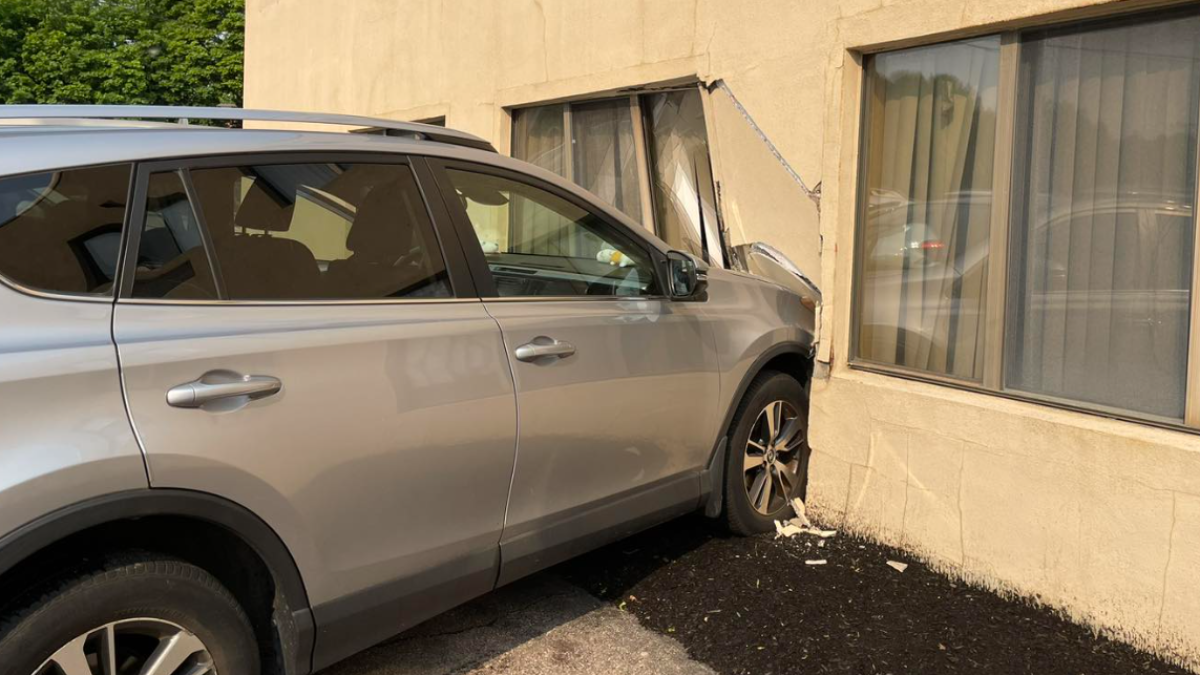 Quincy MA SUV drives into building on Adams Street NBC Boston
