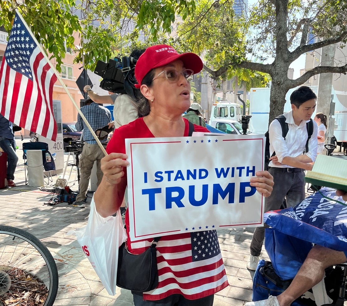 A supporter of former President Donald Trump demonstrates outside of the Wilkie D. Ferguson Jr. United States Courthouse in Miami, June 13, 2023.