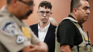 FILE – El Paso Walmart shooting suspect Patrick Crusius pleads not guilty during his arraignment in El Paso, Texas, Oct. 10, 2019. Patrick Crusius, the Texas gunman who killed 23 people in the racist  attack is returning to federal court for sentencing on Wednesday, July 5, 2023. Crusius is facing multiple life sentences after pleading guilty to one of the deadliest mass shootings in U.S. history.