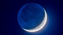 The 4-day-old waxing crescent Moon on April 8, 2019 in a blend of short and long exposures to bring out the faint Earthshine on the dark side of the Moon and deep blue twilight sky while retaining details in the bright sunlit crescent.  This is with the 105mm Traveler refractor and 2X AP Barlow lens for an effective focal length of 1200mm at f/12, and with the cropped-frame Canon 60Da at ISO 400,  in a blend of 7 exposures from 1/30 second to 2 seconds, blended with luminosity masks from ADP Pro3 extension panel in Photoshop. (Photo by: Alan Dyer/VWPics/Universal Images Group via Getty Images)