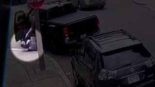 This footage shows the moment a carjacking suspect dropped a baby on the side of the road in Dorchester Frida.y