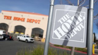 A sign is seen posted on the exterior of a Home Depot store on February 21, 2023 in El Cerrito, California. 