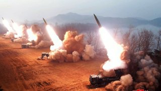 A fire assault drill by North Korean rocket artillery units at an undisclosed location in North Korea in March 2023 in this photo released by North Korea’s Korean Central News Agency (KCNA). Around 6,000 of these units are located in range of South Korean population centers.