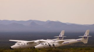 VMS Eve, operated by Virgin Galactic, returns after the company’s first commercial flight to the edge of space, at the Spaceport America facility, in Truth or Consequences, New Mexico, U.S., June 29, 2023. 