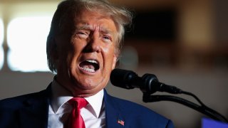 Former U.S. President and Republican presidential candidate Donald Trump looks on as he speaks during a campaign rally in Erie, Pennsylvania, July 29, 2023.