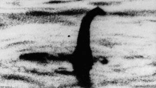 FILE - This undated file photo shows a shadowy shape that some people say is a the Loch Ness Monster in Scotland, later debunked as a hoax.