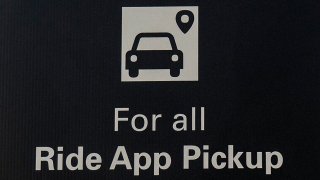 File image of a rideshare or ride app sign
