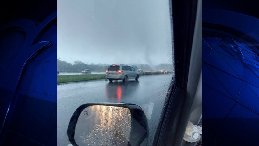 An apparent tornado seen on Interstate 295 in Johnston, Rhode Island, on Friday, Aug. 18, 2023.