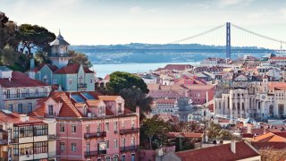 Lisbon’s skyline, showing the city’s Ponte 25 de Abril spanning the river Tagus.