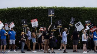 Writers Guild of America and Screen Actors Guild members and supporters on a picket line outside Paramount Studios in Los Angeles on July 17, 2023.