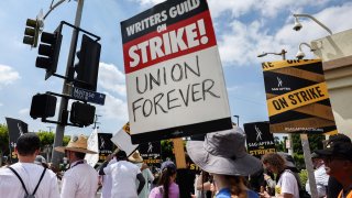 Striking WGA (Writers Guild of America) members picket with striking SAG-AFTRA members outside Paramount Studios on September 18, 2023 in Los Angeles, California.