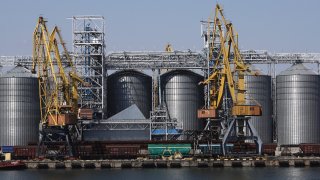 FILE – Exterior view of the grain storage terminal during visit of United Nations Secretary General Antonio Guterres at the Odesa Sea Port, in Odesa, Ukraine, Aug. 19, 2022. Two cargo ships have arrived in one of Ukraine’s ports Saturday, using a temporary Black Sea corridor established by the government. They’re the first since Russia’s withdrawal from a wartime agreement designed to ensure safe grain exports from the invaded country’s ports