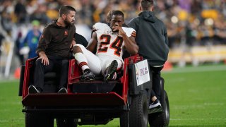 Cleveland Browns running back Nick Chubb is carted off the field with an injury