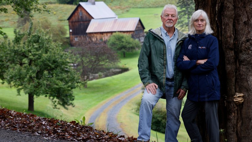 Pomfret, VT – September 13: Mike Doten and Amy Robb pose for a portrait in front of Sleepy Hollow Farm, which has drawn massive crowds during fall foliage season after becoming Instagram famous with photographers and social media influencers vying to get the perfect shot. Doten and Robb are among residents of Cloudland Road who convinced the town of Pomfret to close the road for three weeks at the height of foliage season because so many people inspired by social media were clogging the road to take photographs of the iconic farm, creating potentially dangerous situations and making life difficult for local residents.