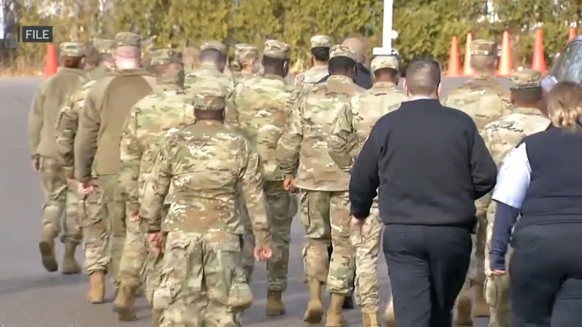 Migrants express gratitude with National Guard set to help at emergency ...