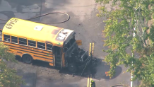 A Boston Public Schools bus that caught fire on Wednesday, Sept. 13, 2023.
