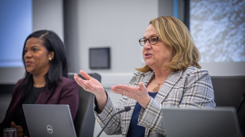 The Cannabis Control Commission is currently meeting in a hybrid format with some commissioners in person at the Union Station headquarters in Worcester. Commissioner Ava Concepcion, left and Chair Shannon O’Brien, right, share a discussion.