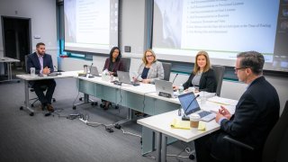 The Cannabis Control Commission is currently meeting in a hybrid format with some commissioners in person at the Union Station headquarters in Worcester. From left: Executive Director Shawn Collins, Commissioner Ava Concepcion, Chair Shannon O’Brien, Commissioners Kimberly Roy, and Bruce Stebbins.