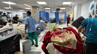 Patients and medics are pictured at Al-Shifa hospital in Gaza City on November 10, 2023, amid ongoing battles between Israel and the Palestinian Hamas movement.