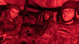 DONETSK OBLAST, UKRAINE – NOVEMBER 11: Ukrainian soldiers take shelter in a cellar in their fighting position in the direction of Bakhmut, Ukraine on November 11, 2023. (Photo by Diego Herrera Carcedo/Anadolu via Getty Images)