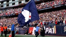 FOXBOROUGH, MASSACHUSETTS - NOVEMBER 05: A Lewiston, Maine strong flag is flown prior to the game between the Washington Commanders and the New England Patriots at Gillette Stadium on November 05, 2023 in Foxborough, Massachusetts. (Photo by Maddie Meyer/Getty Images)