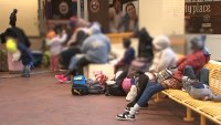 Migrant families begin temporary stay in Mass. transportation building