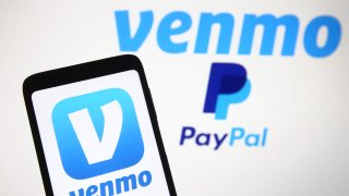 The Venmo logo displayed on a smartphone.