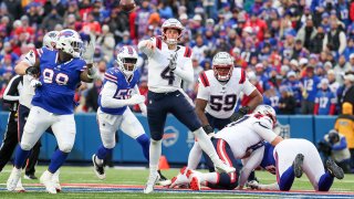 Bailey Zappe #4 of the New England Patriots throws a pass during the second quarter of a game against the Buffalo Bills at Highmark Stadium on December 31, 2023 in Orchard Park, New York.