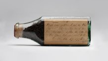 An original bottle of tea from the Boston Tea Party is on display to mark the 250th anniversary.