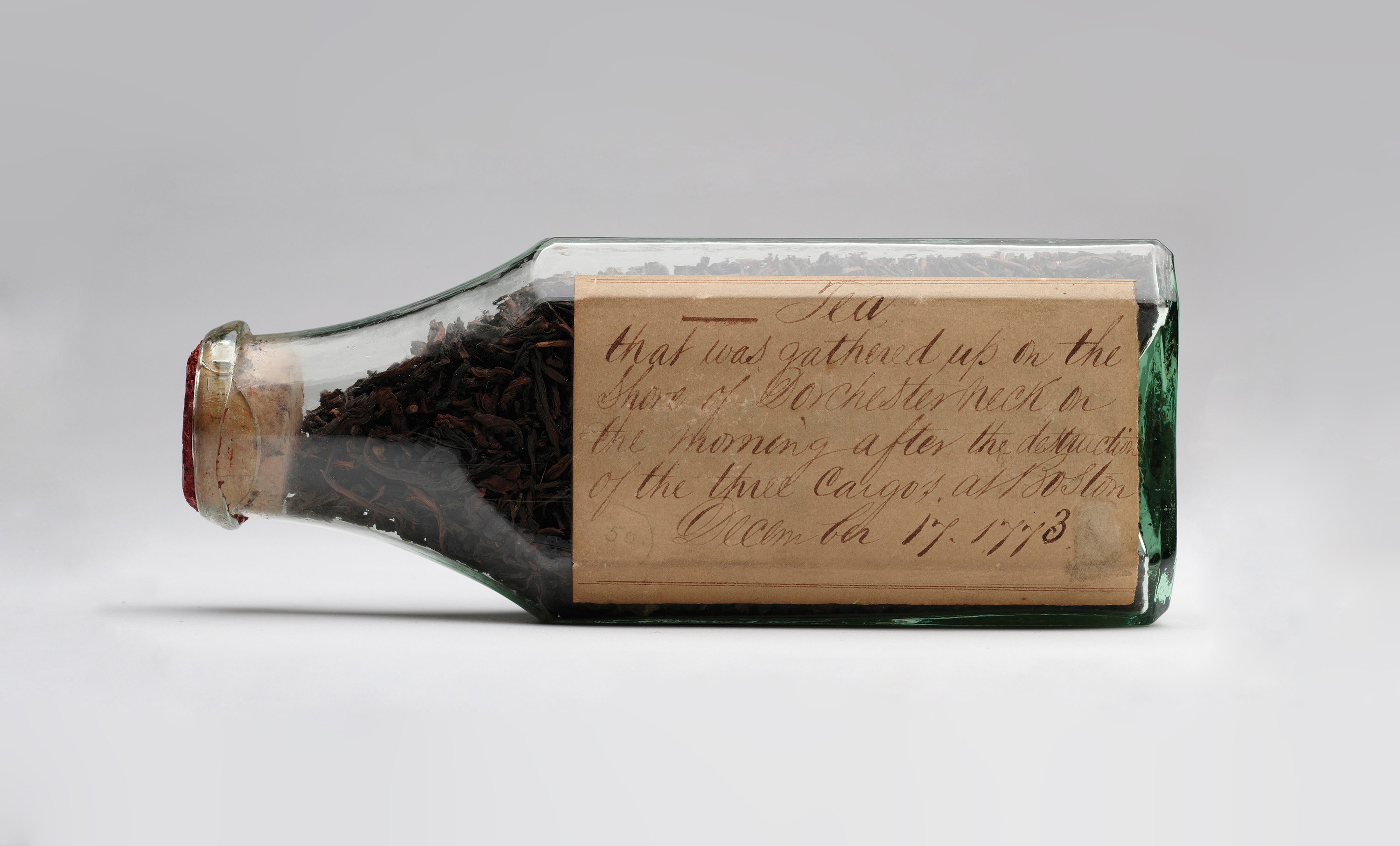 An original bottle of tea from the Boston Tea Party is on display to mark the 250th anniversary.