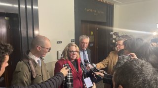 Shannon O’Brien, who is suspended from the Cannabis Control Commission, speaks with reporters outside a hearing with a judge on Dec. 4 in her attempt to be reinstated.