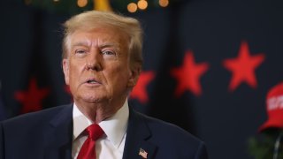 Former U.S. President Donald Trump looks on during a campaign event in Waterloo, Iowa, on Dec. 19, 2023.