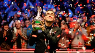 Ronnie O’Sullivan poses with the trophy after winning against Judd Trump on day 7 of the 2024 Spreadex World Grand Prix at Morningside Arena on January 21, 2024 in Leicester, England.