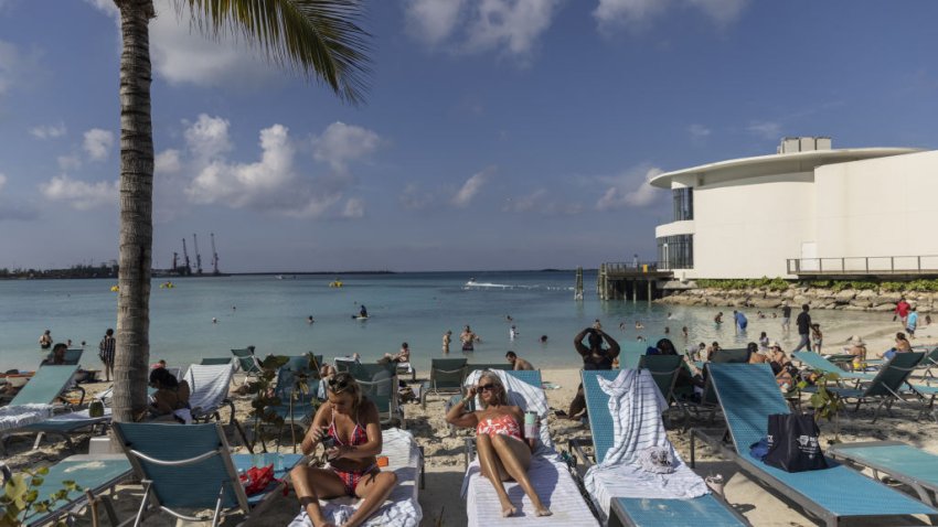 Tourists at a beach in Nassau, Bahamas