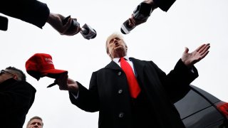 LONDONDERRY, NEW HAMPSHIRE – JANUARY 23: Republican presidential candidate, former U.S. President Donald Trump talks to reporters while visiting the polling site at Londonderry High School on January 23, 2024 in Londonderry, New Hampshire. With Florida Gov. Ron DeSantis having dropped out of the race two days earlier, Trump and fellow candidate former UN Ambassador Nikki Haley are battling it out in this first-in-the-nation primary. (Photo by Chip Somodevilla/Getty Images)