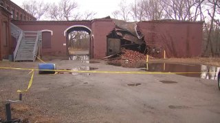 A vacant building in Whitman, Massachusetts, partially collapsed on Wednesday, Jan, 10, 2024.