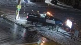 A snow plow that crashed into an Acushnet, Massachusetts, church's sign and fence, destroying both, on Sunday, Jan. 7, 2024.