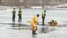Boston firefighters training for icy water rescues in Fenway on Tuesday, Jan. 23, 2024.